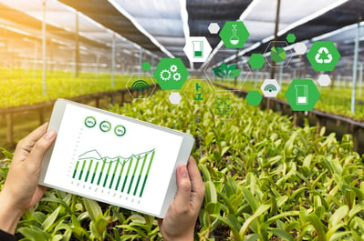 agriculture technology concept man Agronomist using a tablet internet of things report