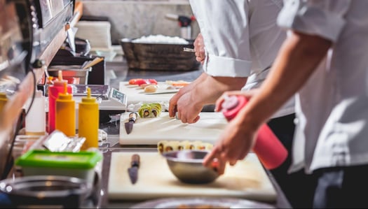 cooks preparing a meal