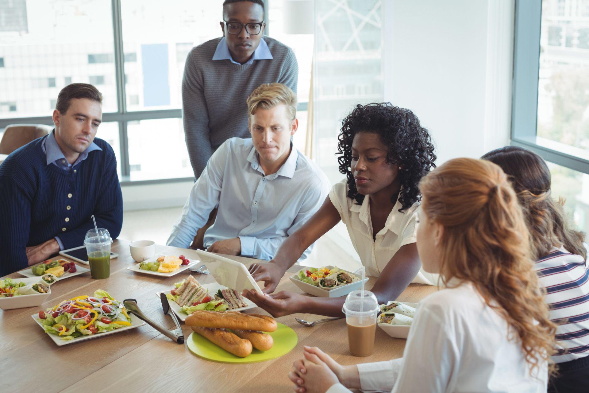 Business coworkers having breakfast